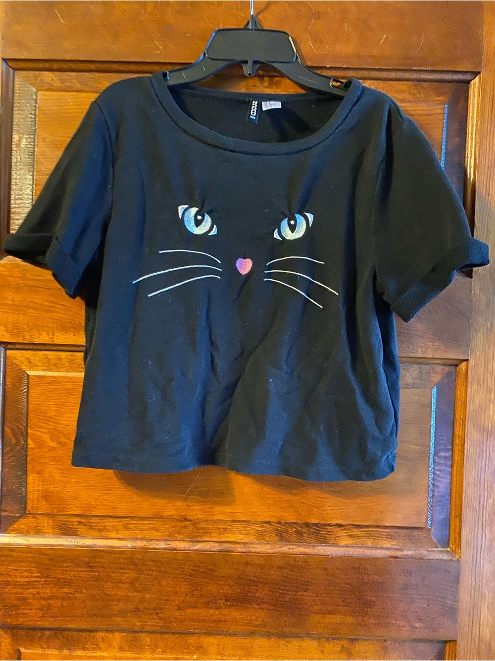 Divided Black Crop Top with Cat Face Graphic